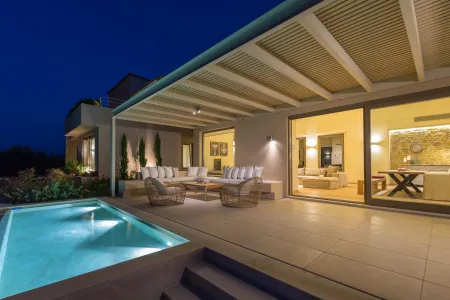 pool and villa at night