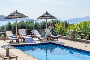 Popular Blue Island villa in Elounda, perfect for family and friends, boasting all the mod-cons.