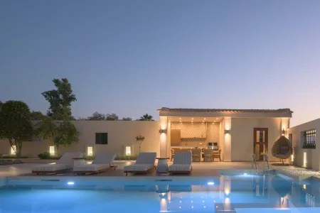  pool and bbq at night