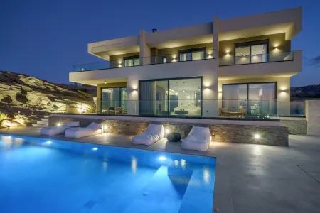  villa and pool at night