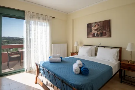 Double bedroom with balcony view