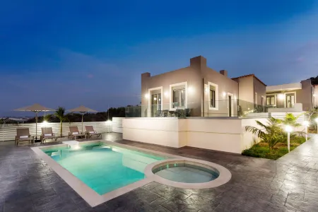 Exterior villa vew with ambient lighting during night time