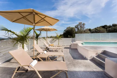 Pool area with surrounding landscape