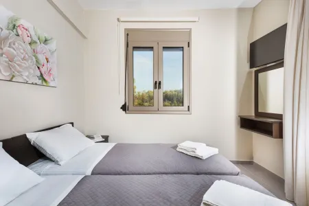 Bright twin room with landscape view